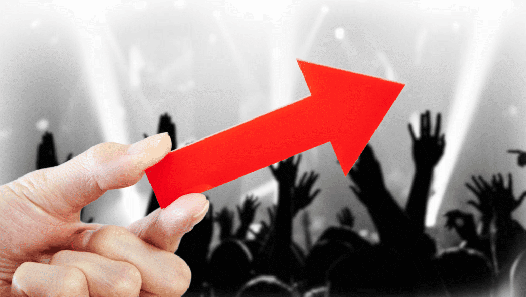 A hand holding an arrow to show reddit karma growth.